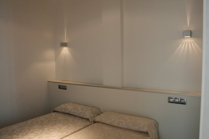 Imagen de la habitación del Apartamentos Senabre Palais. Foto 6