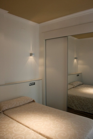 Imagen de la habitación del Apartamentos Senabre Palais. Foto 7