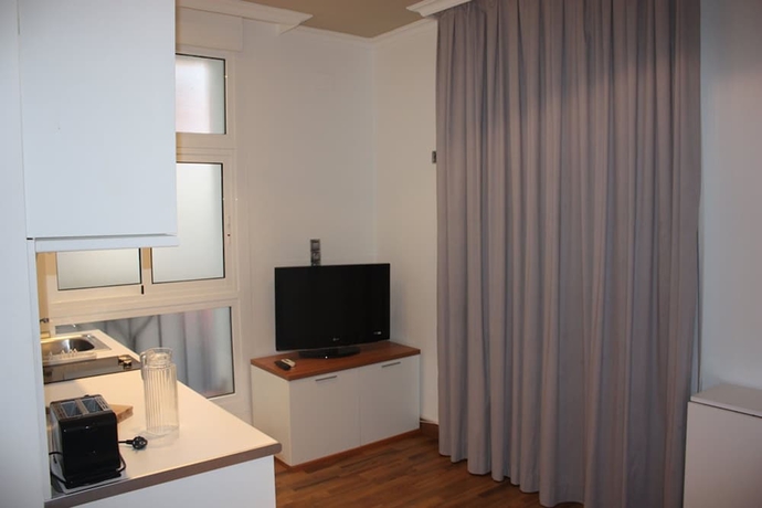Imagen de la habitación del Apartamentos Senabre Palais. Foto 15