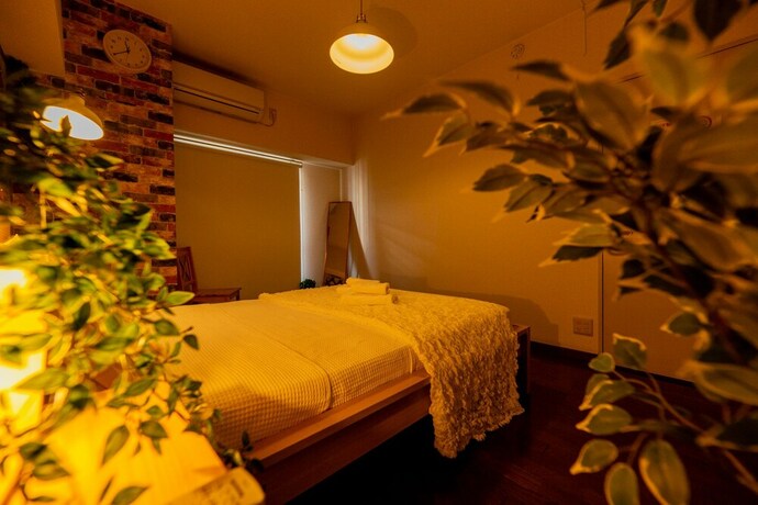 Imagen de la habitación del Apartamentos Shinsaibashi Midtown Apartments. Foto 17