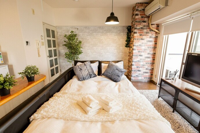 Imagen de la habitación del Apartamentos Shinsaibashi Midtown Apartments. Foto 32