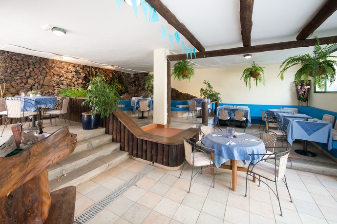 Imagen del bar/restaurante del Apartamentos Side Shore. Foto 7