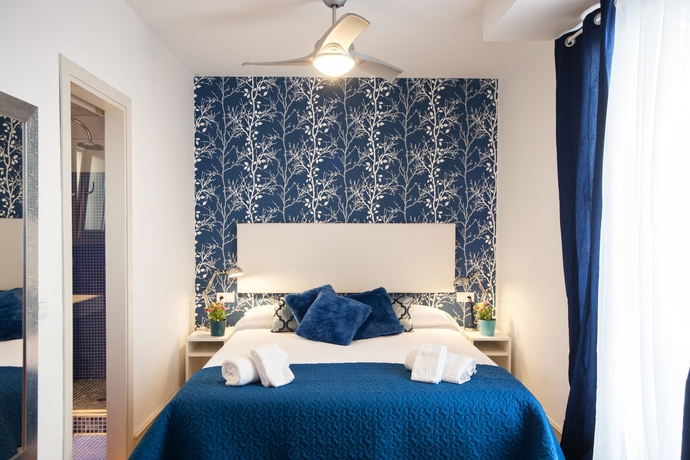 Imagen de la habitación del Apartamentos Singular Peral. Foto 11