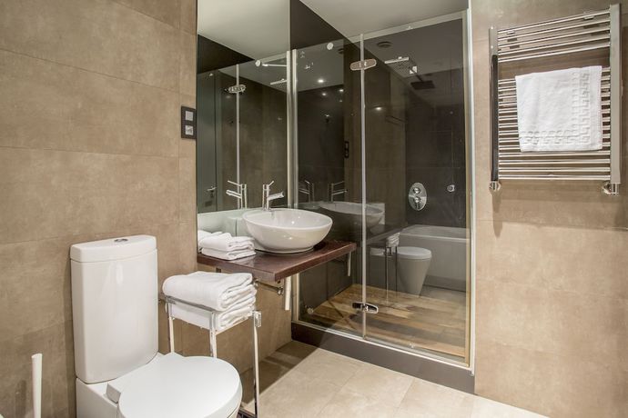 Imagen de la habitación del Apartamentos Slow Suites Gran Vía. Foto 16