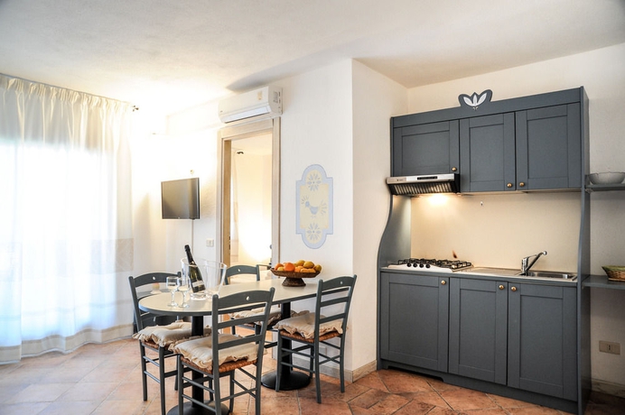 Imagen de los interiores del Apartamentos Smeralda Village By Elite Smeralda Room. Foto 11