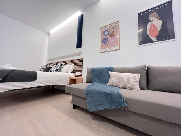 Imagen de la habitación del Apartamentos Sorolla Urban Suites. Foto 4