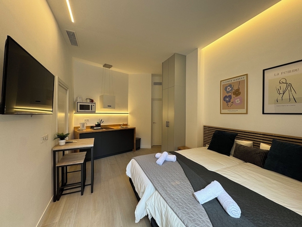 Imagen de la habitación del Apartamentos Sorolla Urban Suites. Foto 5