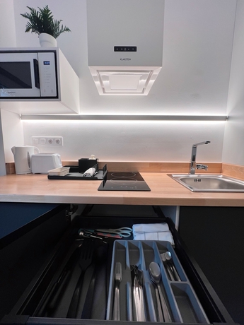 Imagen de la habitación del Apartamentos Sorolla Urban Suites. Foto 6