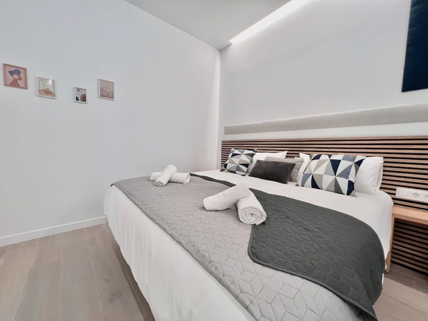 Imagen de la habitación del Apartamentos Sorolla Urban Suites. Foto 7