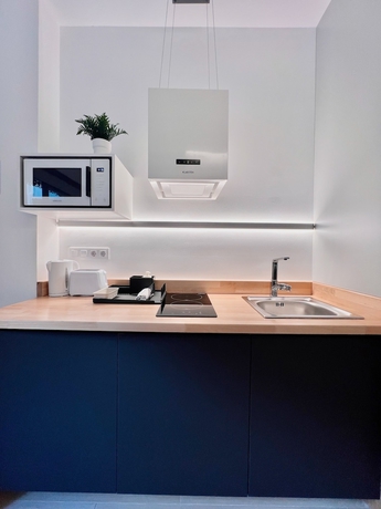 Imagen de la habitación del Apartamentos Sorolla Urban Suites. Foto 8