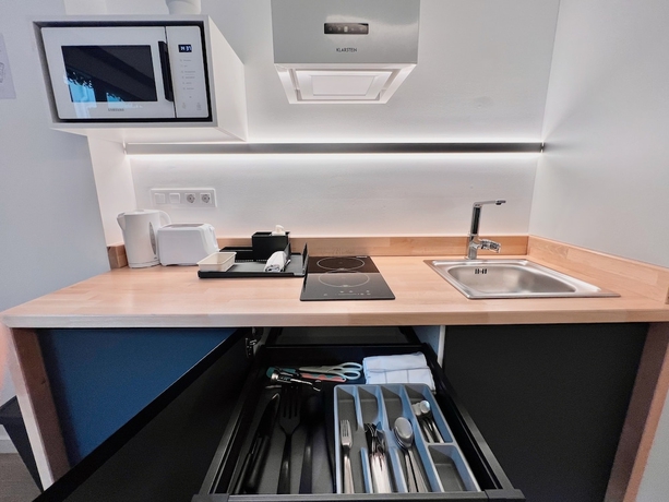 Imagen de la habitación del Apartamentos Sorolla Urban Suites. Foto 11
