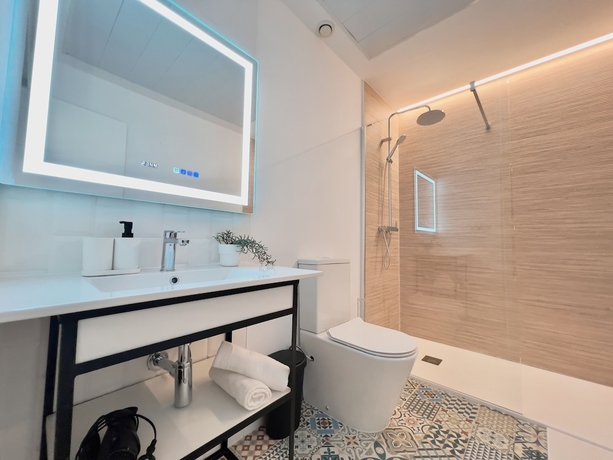 Imagen de la habitación del Apartamentos Sorolla Urban Suites. Foto 12