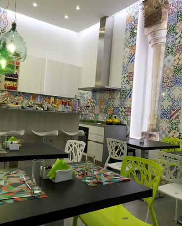 Imagen del bar/restaurante del Apartamentos Sorrento Flats. Foto 3