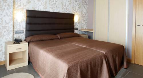 Imagen de la habitación del Apartamentos Spa Cueto. Foto 5