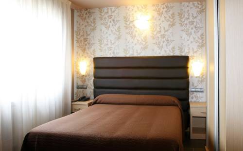 Imagen de la habitación del Apartamentos Spa Cueto. Foto 14