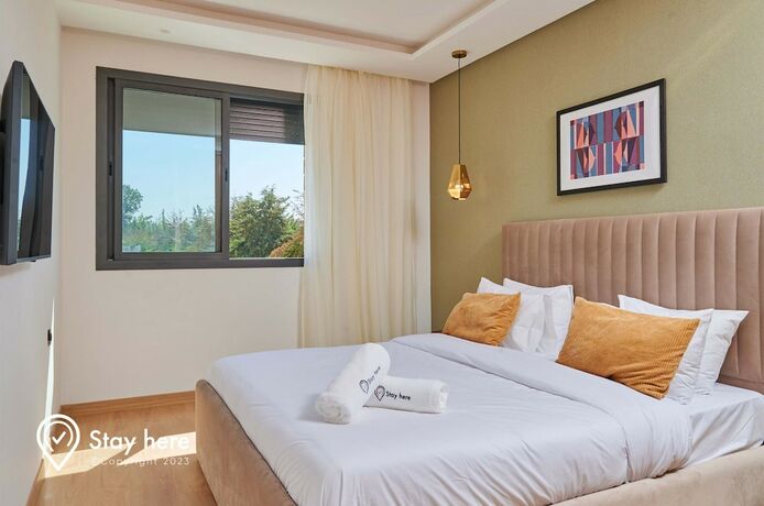 Imagen de la habitación del Apartamentos Stayhere Rabat - Hay Riad - Sophisticated Residence. Foto 13