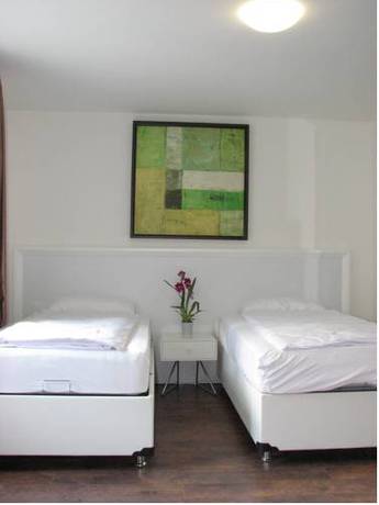 Imagen de la habitación del Apartamentos Suite Apartments By Livingdowntown. Foto 10