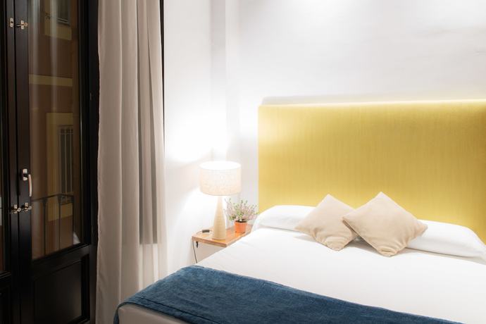 Imagen de la habitación del Apartamentos Suites Campo del Principe. Foto 4