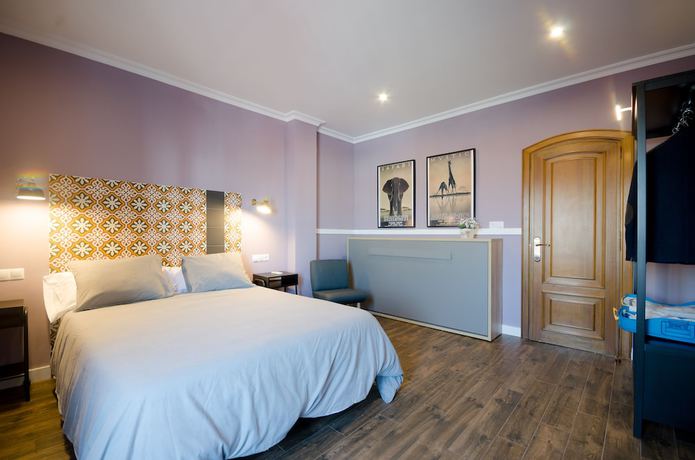 Imagen de la habitación del Apartamentos Suites Roma. Foto 3