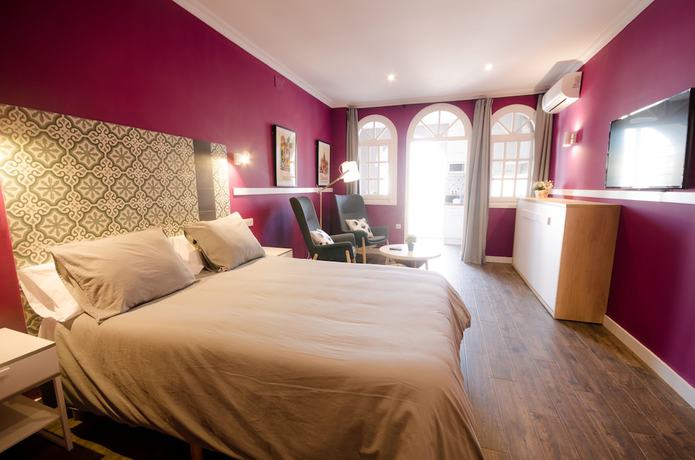 Imagen de la habitación del Apartamentos Suites Roma. Foto 5