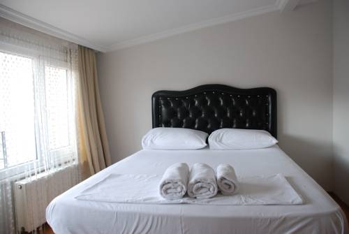 Imagen de la habitación del Apartamentos Taksim 9 Suites. Foto 86