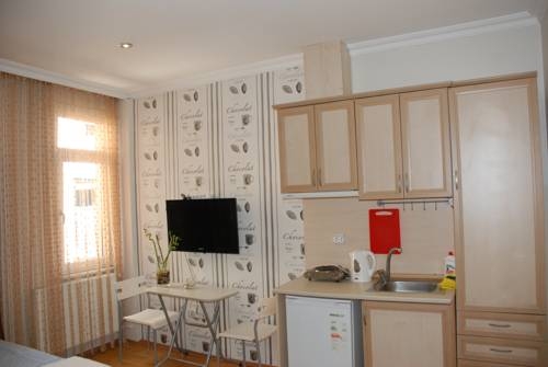 Imagen de la habitación del Apartamentos Taksim 9 Suites. Foto 128