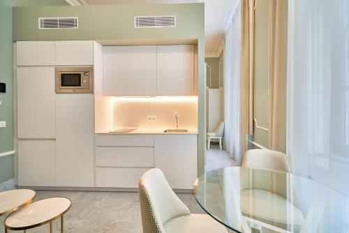 Imagen de la habitación del Apartamentos Tandem Palacio Veedor de Galeras Suites. Foto 6