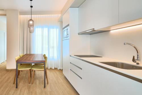 Imagen de la habitación del Apartamentos Tandem Pópulo. Foto 13