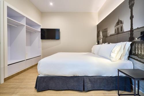 Imagen de la habitación del Apartamentos Tandem Pópulo. Foto 15