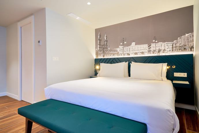 Imagen de la habitación del Apartamentos Tandem Torres De Cádiz Suites. Foto 13