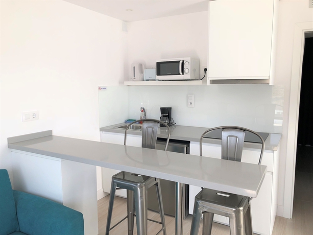 Imagen de la habitación del Apartamentos The Hive Boutique - Adults Only. Foto 13