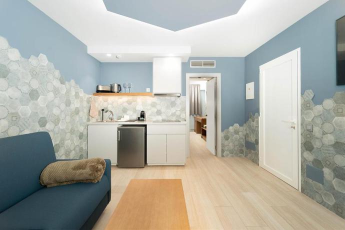 Imagen de la habitación del Apartamentos The Hive Boutique - Adults Only. Foto 2