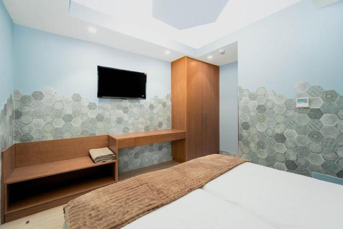 Imagen de la habitación del Apartamentos The Hive Boutique - Adults Only. Foto 7