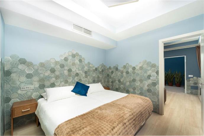 Imagen de la habitación del Apartamentos The Hive Boutique - Adults Only. Foto 8