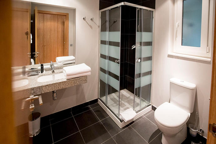 Imagen de la habitación del Apartamentos The Lodge At Ribasol 3000 Aptos. Foto 6