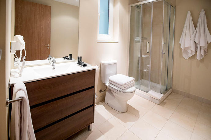 Imagen de la habitación del Apartamentos The Lodge At Ribasol 3000 Aptos. Foto 8