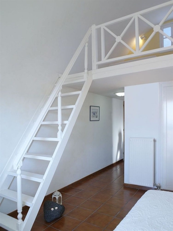 Imagen de los interiores del Apartamentos The Noverian Bios Santorini Boutique. Foto 12