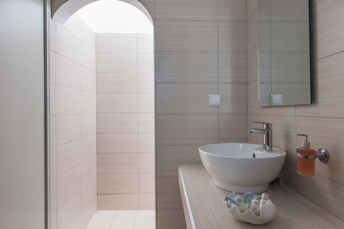 Imagen de la habitación del Apartamentos Thira's Dolphin. Foto 8