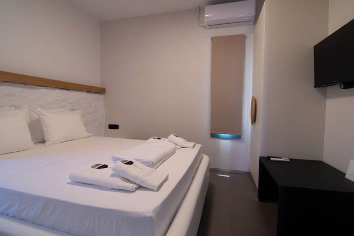 Imagen de la habitación del Apartamentos Thronos Suites. Foto 18