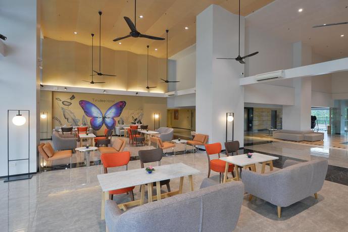 Imagen del bar/restaurante del Apartamentos Tinidee Hotel@Bangkok Golf Club. Foto 10