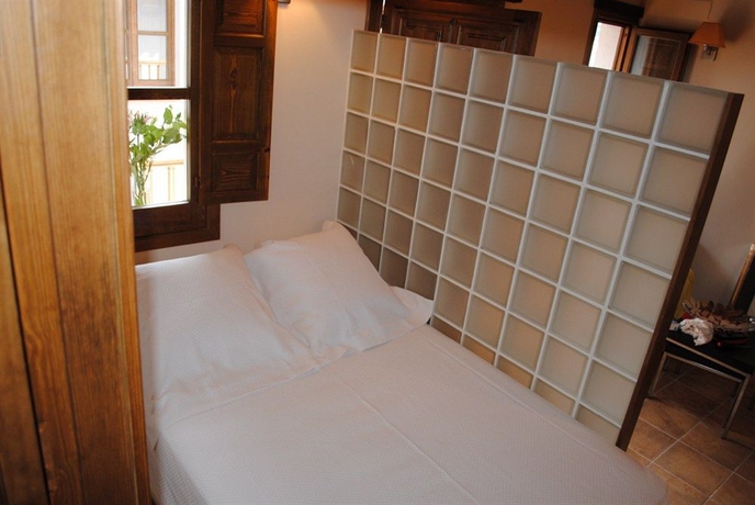 Imagen de la habitación del Apartamentos Turísticos Alhambra. Foto 7