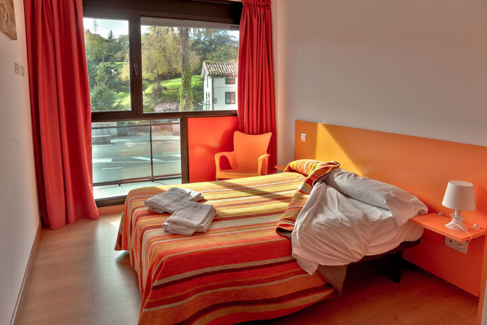 Imagen de la habitación del Apartamentos Turísticos Bahía De Boó. Foto 3