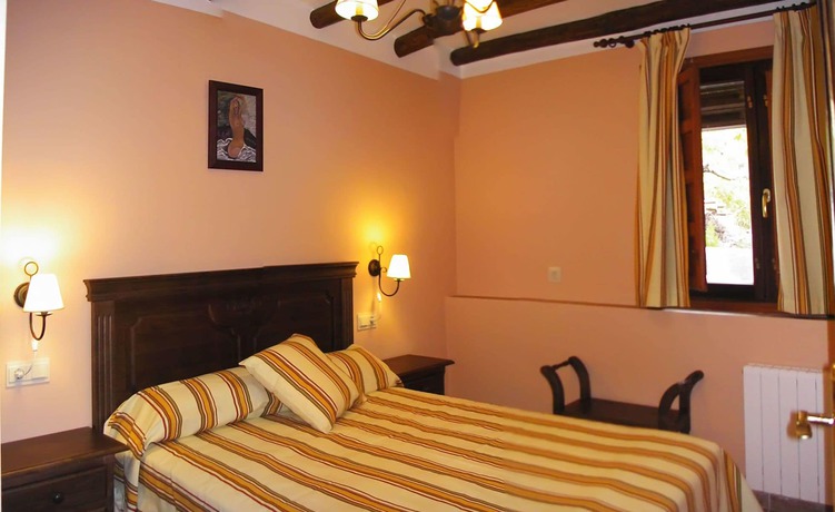 Imagen de la habitación del Apartamentos Turísticos Casalpujarra. Foto 18