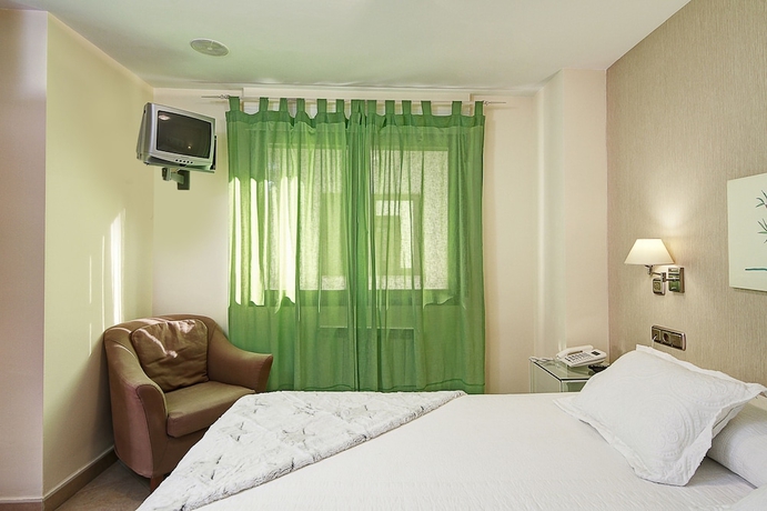 Imagen de la habitación del Apartamentos Turísticos Centro. Foto 18