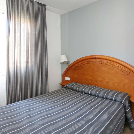 Imagen de la habitación del Apartamentos Turísticos Jardines del Plaza. Foto 4