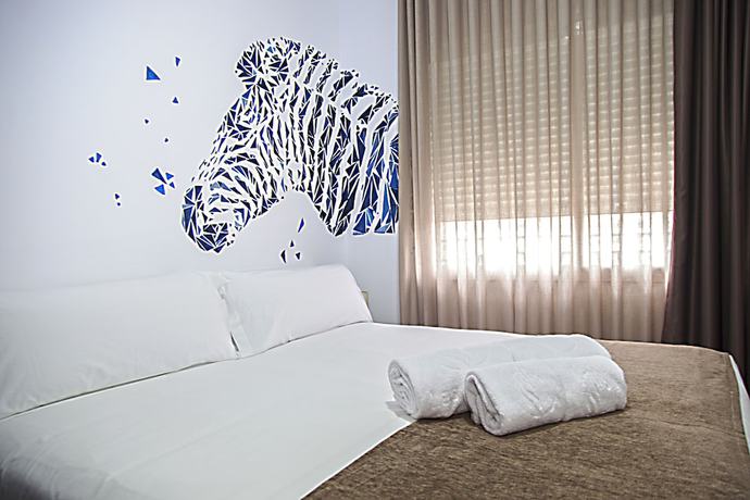 Imagen de la habitación del Apartamentos Turísticos Las Cebras. Foto 4