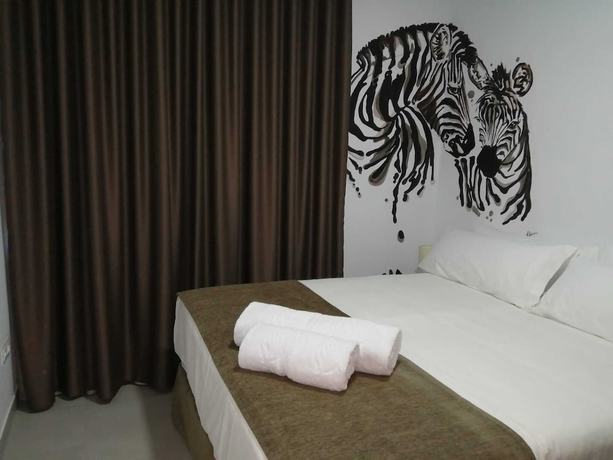 Imagen de la habitación del Apartamentos Turísticos Las Cebras. Foto 10