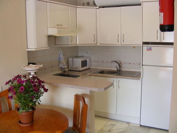 Imagen de la habitación del Apartamentos Turísticos Las Rosas De Capistrano. Foto 3