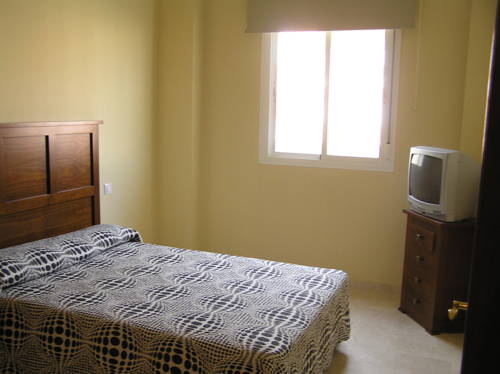 Imagen de la habitación del Apartamentos Turísticos Los Girasoles. Foto 4