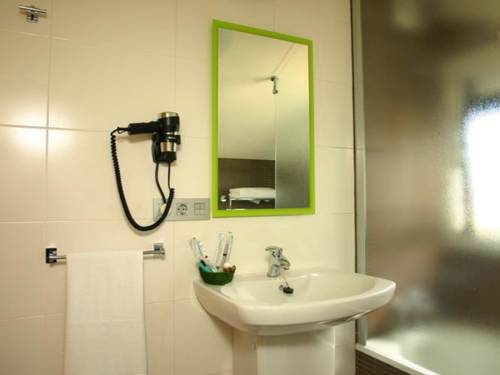 Imagen de la habitación del Apartamentos Turísticos Playa de Tapia. Foto 5